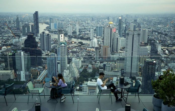 Visitors tour King Power Mahanakhon, Thailand's tallest building in Bangkok