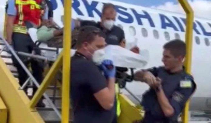 new born baby on plane board