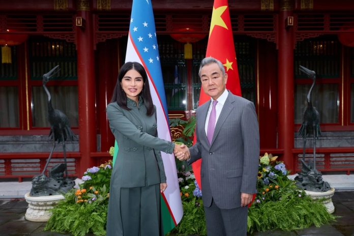 uzbekistan saida mirizyayeva and chinese mfa wang yi