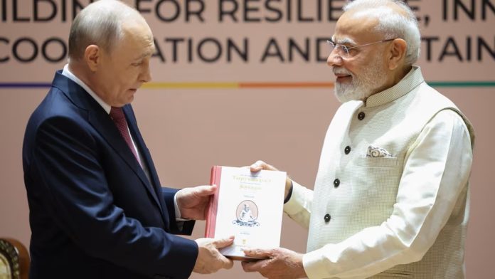 indian modi gifts book to putin